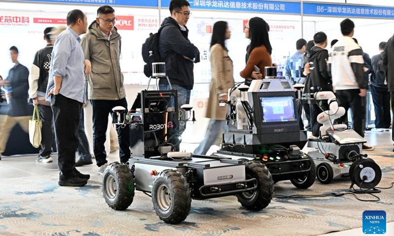 Participants visit the exhibition area of the 2024 China Automation Congress in Qingdao, east China's Shandong Province, Nov. 2, 2024. The 2024 China Automation Congress, which focuses on the deep integration of automation and artificial intelligence as well as explores the innovative development of new industries and technologies, would last from Nov. 1 to Nov. 3 here. (Photo: Xinhua)