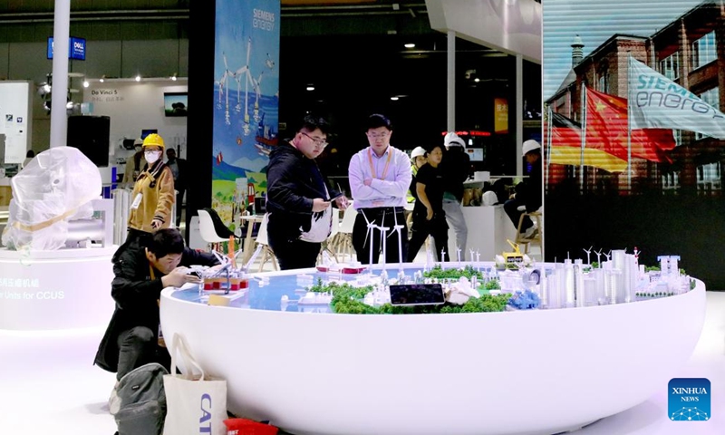 Workers set up exhibition booths for the upcoming 7th China International Import Expo (CIIE) at the National Exhibition and Convention Center (Shanghai), the main venue for the CIIE, in east China's Shanghai, Nov. 2, 2024. Preparations for the 7th CIIE, which is scheduled to take place in Shanghai from Nov. 5 to 10, have entered the final stage. (Photo: Xinhua)