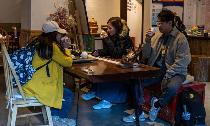 Tourists take a rest at a homestay at Yading scenic spot in Daocheng County of Tibetan Autonomous Prefecture of Garze, southwest China's Sichuan Province, Oct. 31, 2024. (Photo: Xinhua)