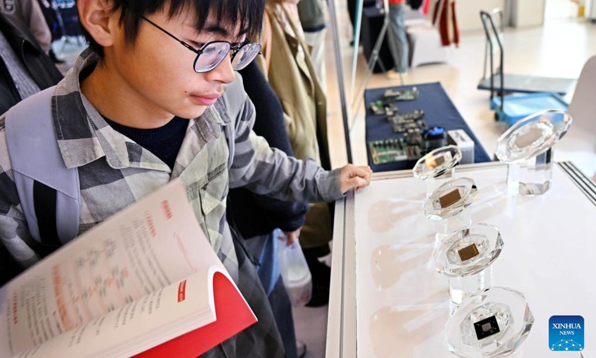 Participants visit the exhibition area of the 2024 China Automation Congress in Qingdao, east China's Shandong Province, Nov. 2, 2024. The 2024 China Automation Congress, which focuses on the deep integration of automation and artificial intelligence as well as explores the innovative development of new industries and technologies, would last from Nov. 1 to Nov. 3 here.  (Photo: Xinhua)