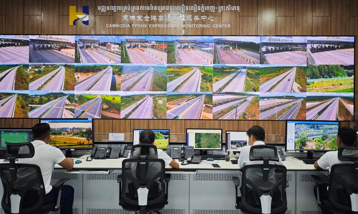 Staff members work in a traffic camera control room of the Phnom Penh-Sihanoukville Expressway in Phnom Penh, Cambodia, on Nov. 1, 2024. The number of users of the Chinese-invested Phnom Penh-Sihanoukville Expressway in Cambodia had hit 10 million during the first two years of its operation. (Cambodian PPSHV Expressway Co., Ltd./Handout via Xinhua)