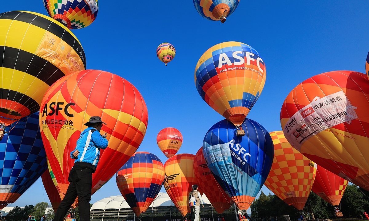 Hot air balloon teams from all over the country take to the skies in Wuyi, East China's Zhejiang Province on November 3, 2024 as they gather to participate in a hot air balloon open competition. Photo: VCG