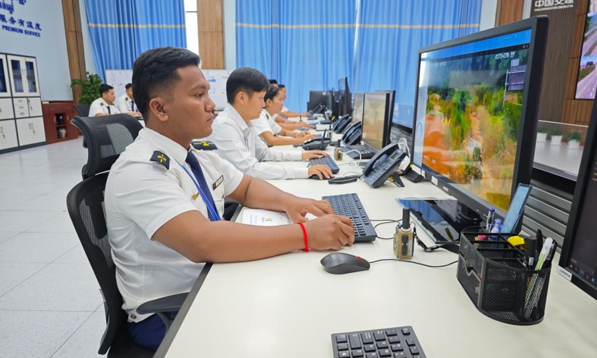 Staff members work in a traffic camera control room of the Phnom Penh-Sihanoukville Expressway in Phnom Penh, Cambodia, on Nov. 1, 2024. The number of users of the Chinese-invested Phnom Penh-Sihanoukville Expressway in Cambodia had hit 10 million during the first two years of its operation. (Cambodian PPSHV Expressway Co., Ltd./Handout via Xinhua)