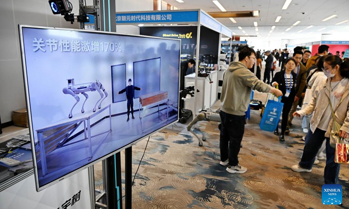 Participants visit the exhibition area of the 2024 China Automation Congress in Qingdao, east China's Shandong Province, Nov. 2, 2024. The 2024 China Automation Congress, which focuses on the deep integration of automation and artificial intelligence as well as explores the innovative development of new industries and technologies, would last from Nov. 1 to Nov. 3 here.  (Photo: Xinhua)