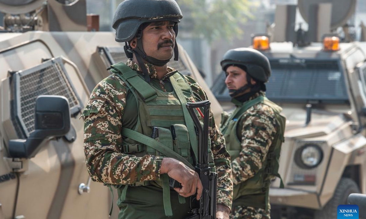 Indian paramilitary troopers stand guard near the site of a gunfight in Srinagar, the summer capital of Indian-controlled Kashmir, Nov. 2, 2024. Three militants were killed and four government forces personnel wounded Saturday in two separate gunfights in Indian-controlled Kashmir, police said. (Photo: Xinhua)