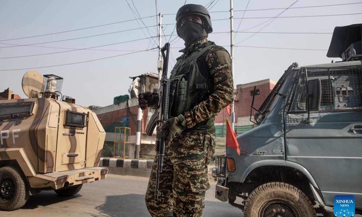 An Indian paramilitary trooper stands guard near the site of a gunfight in Srinagar, the summer capital of Indian-controlled Kashmir, Nov. 2, 2024. Three militants were killed and four government forces personnel wounded Saturday in two separate gunfights in Indian-controlled Kashmir, police said. (Photo: Xinhua)