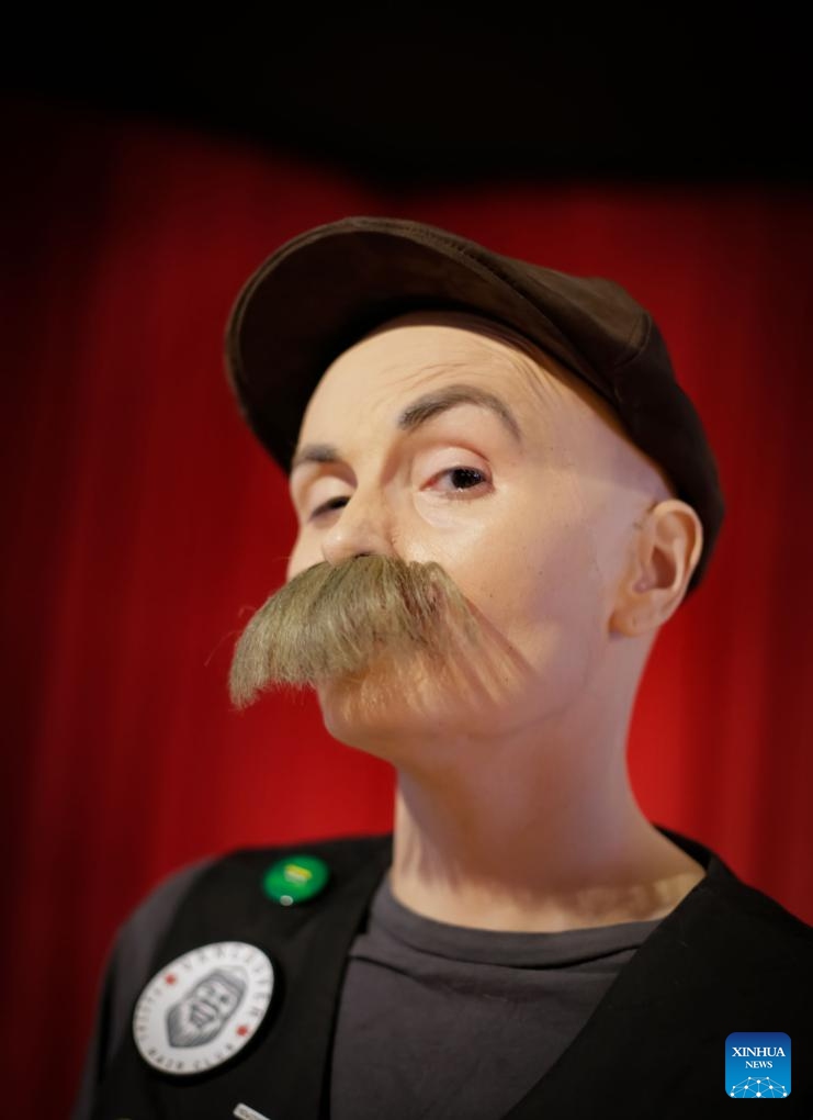 A female contestant wearing artificial facial hair competes in the Whiskerina category during the annual Facial Hair Competition held in Vancouver, British Columbia, Canada, Nov. 2, 2024.  (Photo: Xinhua)