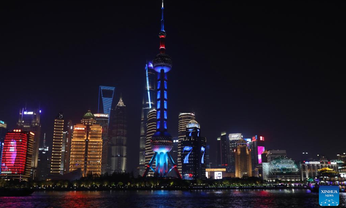 Landmarks are lit up to welcome the 7th China International Import Expo (CIIE) in Lujiazui area in east China's Shanghai, Nov. 3, 2024. The 7th CIIE will be held in Shanghai from Nov. 5 to 10. (Photo: Xinhua)