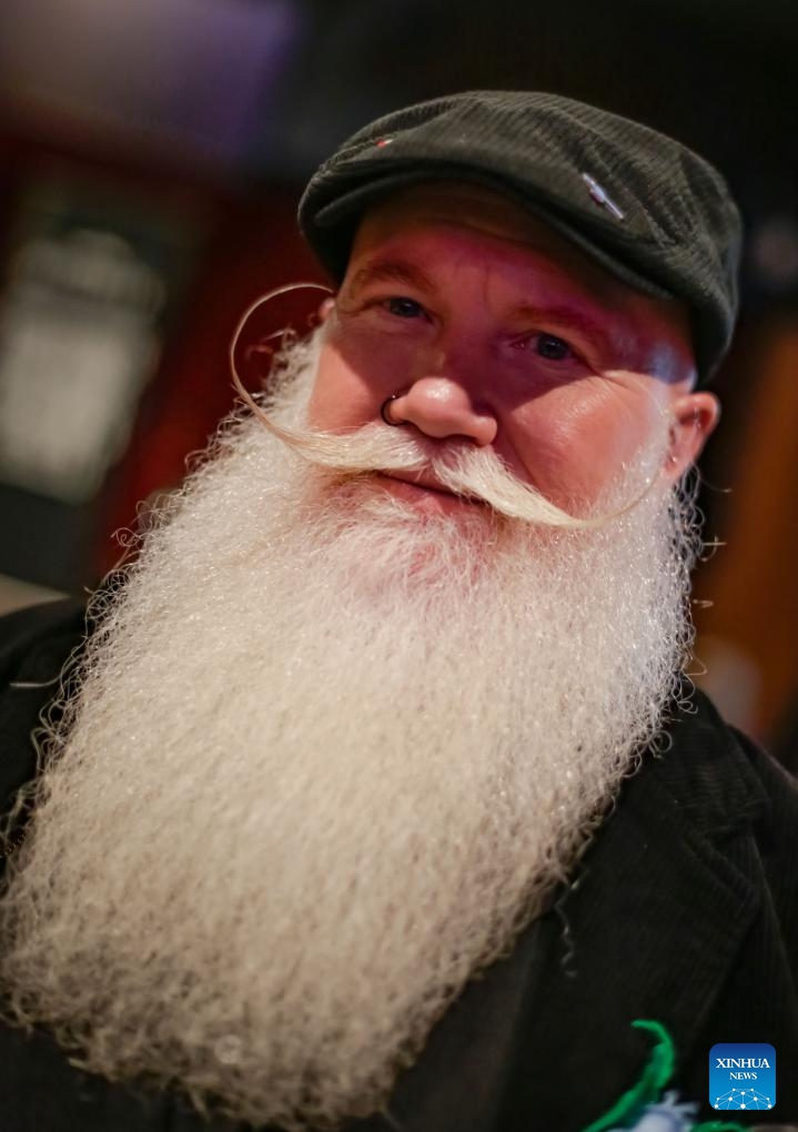 A participant displays his facial hair during the annual Facial Hair Competition in Vancouver, British Columbia, Canada, Nov. 2, 2024.  (Photo: Xinhua)