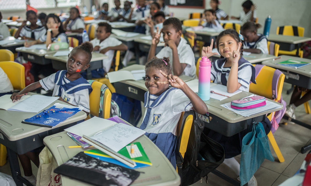 Students at Chung Wah School in Honiara, Solomon Islands wave to the camera in July 2023. Photo: Shan Jie/GT