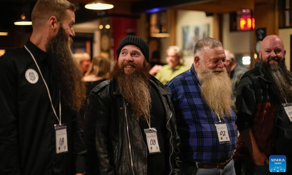 Contestants line up before the judges during the annual Facial Hair Competition in Vancouver, British Columbia, Canada, Nov. 2, 2024. (Photo: Xinhua)