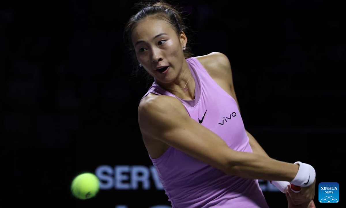 Zheng Qinwen of China competes during the round robin match against Elena Rybakina of Kazakhstan at WTA Finals tennis tournament in Riyadh, Saudi Arabia, Nov. 4, 2024. (Photo: Xinhua)