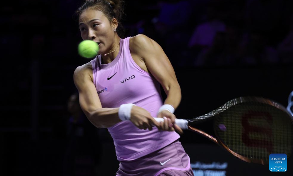 Zheng Qinwen of China competes during the round robin match against Elena Rybakina of Kazakhstan at WTA Finals tennis tournament in Riyadh, Saudi Arabia, Nov. 4, 2024. (Photo: Xinhua)