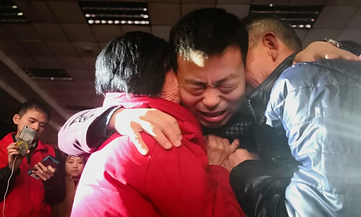 An abducted child is reunited with his elderly parents in Hanzhong, Northwest China's Shaanxi Province, in 2019. Photo: VCG