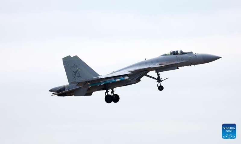 A J-15 fighter jet conducts adaptive training for the upcoming 15th Airshow China in Zhuhai, south China's Guangdong Province, Nov. 9, 2024. The 15th China International Aviation and Aerospace Exhibition, also known as Airshow China, will be held in Zhuhai from Nov. 12 to 17. (Photo by Ma Ruizhao/Xinhua)