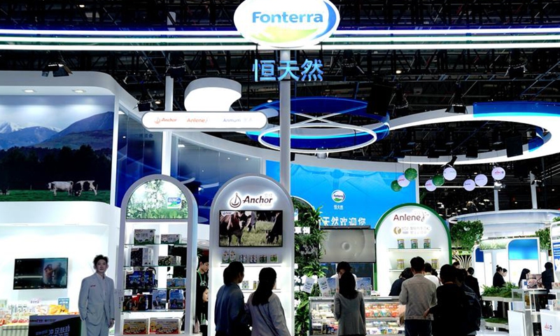 People visit the booth of Fonterra, a full-time attender of the China International Import Expo (CIIE), during the 7th CIIE in east China's Shanghai, Nov. 8, 2024. (Xinhua/Zhang Jiansong)