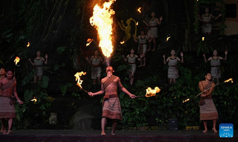 Actors perform at Binglanggu tourism area in Baoting Li and Miao Autonomous County, south China's Hainan Province, Nov. 4, 2024. (Photo: Xinhua)