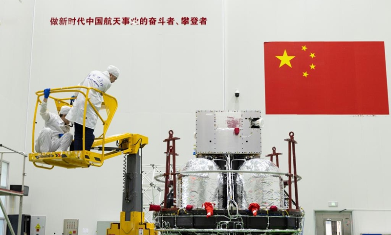 Technicians check the Solar wind Magnetosphere Ionosphere Link Explorer (SMILE) at a workshop of the Innovation Academy for Microsatellites of Chinese Academy of Sciences (CAS) in Shanghai, east China, Nov. 4, 2024. (Photo: Xinhua)