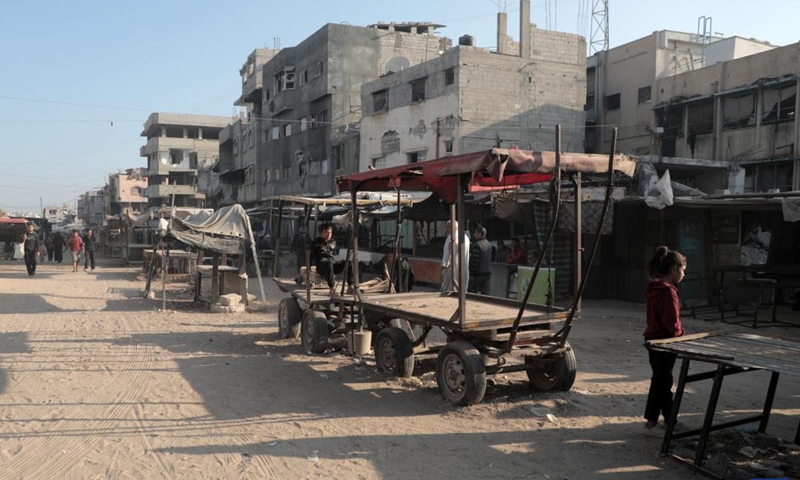 People are seen at an empty market in the southern Gaza Strip city of Khan Younis, on Nov. 5, 2024. (Photo: Xinhua)