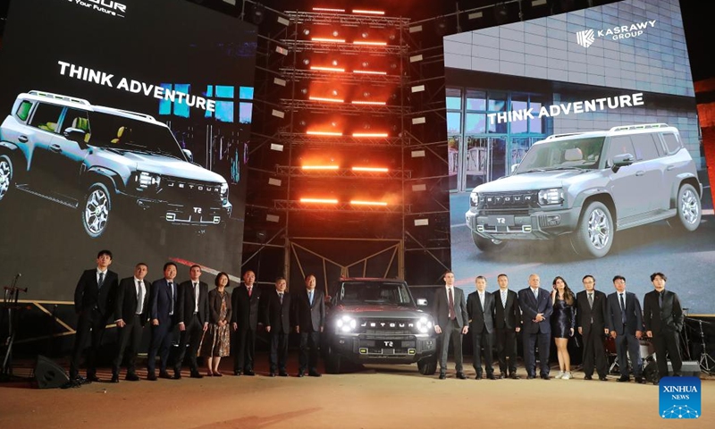 Visitors pose for photos at the launching ceremony of Jetour Auto's first off-road SUV model T2 in Cairo, Egypt, Nov. 4, 2024. (Photo: Xinhua)