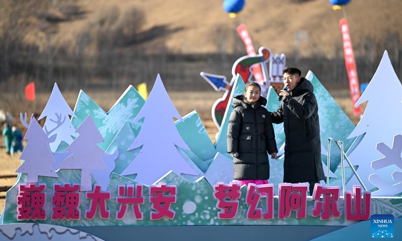 Singers perform at an ice and snow event in Arxan of Hinggan League, north China's Inner Mongolia Autonomous Region, Nov. 10, 2024. The opening ceremony of the Arxan 2024-2025 ice and snow season and 19th ice and snow festival was held here on Sunday. Throughout the ice and snow season, Arxan will host a variety of activities to attract visitors. (Xinhua/Bei He)