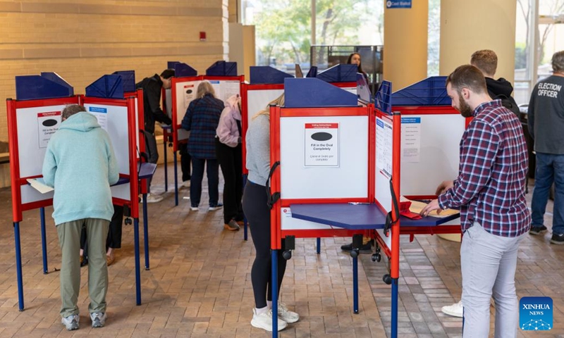 Voters fill in their ballots at a polling station during the 2024 U.S. presidential election in Arlington, Virginia, the United States, Nov. 5, 2024. (Photo: Xinhua)