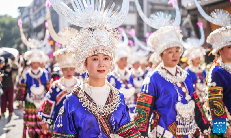 People of Miao ethnic group in traditional costumes take part in a parade to celebrate the Miao New Year at Leishan County of Qiandongnan Miao and Dong Autonomous Prefecture, southwest China's Guizhou Province, Nov. 10, 2024. Miao New Year is a major festival of people of Miao ethnic group. In 2008, the festival was listed as a national-level intangible cultural heritage. (Xinhua/Tao Liang)