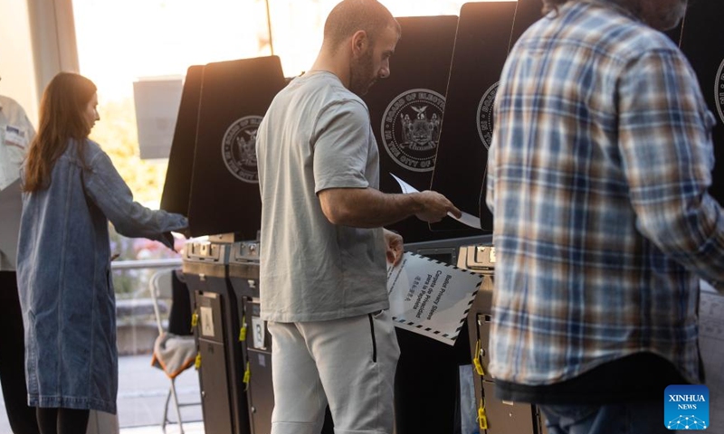 Voters cast their ballots at a polling station during the 2024 U.S. presidential election at the Brooklyn Museum in New York, the United States, on Nov. 5, 2024. (Photo: Xinhua)