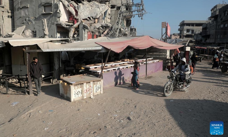 People are seen at an empty market in the southern Gaza Strip city of Khan Younis, on Nov. 5, 2024. (Photo: Xinhua)