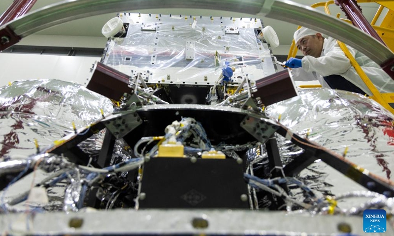 A technician checks the Solar wind Magnetosphere Ionosphere Link Explorer (SMILE) at a workshop of the Innovation Academy for Microsatellites of Chinese Academy of Sciences (CAS) in Shanghai, east China, Nov. 4, 2024. (Photo: Xinhua)