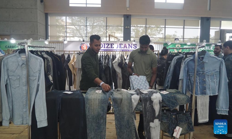 People visit the 17th edition of Bangladesh's largest denim exposition in Dhaka, Bangladesh, Nov. 4, 2024. (Photo: Xinhua)