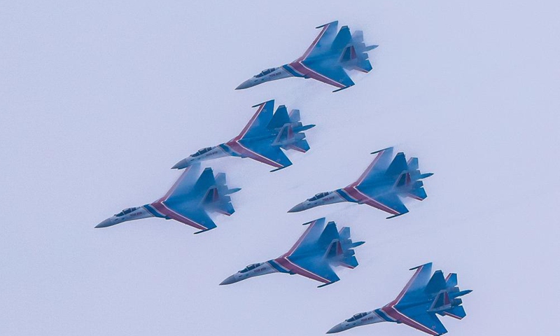 Fighter jets of the Russian Knights aerobatic team conduct adaptive training for the upcoming Airshow China in Zhuhai, south China's Guangdong Province, Nov. 10, 2024. The 15th China International Aviation and Aerospace Exhibition, also known as Airshow China, will be held in Zhuhai from Nov. 12 to 17. (Xinhua/Liu Dawei)