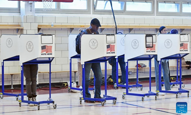 Voters fill in their ballots at a polling station during the 2024 U.S. presidential election in Manhattan, New York City, the United States, on Nov. 5, 2024. (Photo: Xinhua)