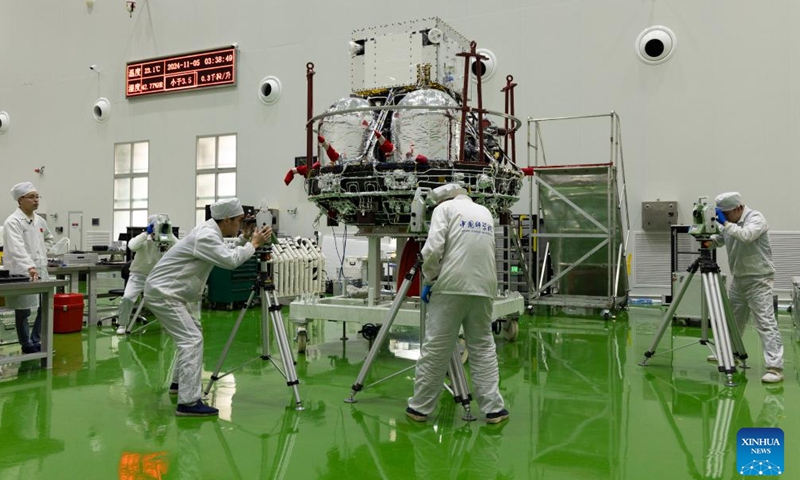 Technicians measure the Solar wind Magnetosphere Ionosphere Link Explorer (SMILE) at a workshop of the Innovation Academy for Microsatellites of Chinese Academy of Sciences (CAS) in Shanghai, east China, Nov. 4, 2024. (Photo: Xinhua)