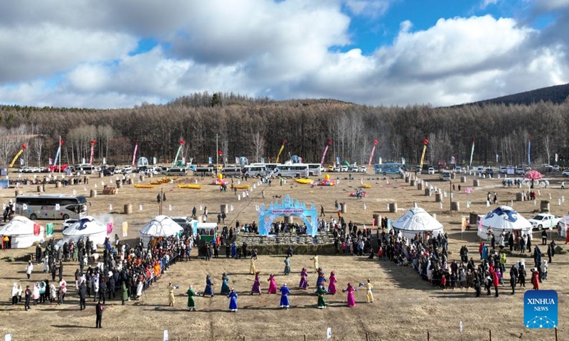 A drone photo taken on Nov. 10, 2024 shows a view of an ice and snow event in Arxan of Hinggan League, north China's Inner Mongolia Autonomous Region. The opening ceremony of the Arxan 2024-2025 ice and snow season and 19th ice and snow festival was held here on Sunday. Throughout the ice and snow season, Arxan will host a variety of activities to attract visitors. (Xinhua/Bei He)