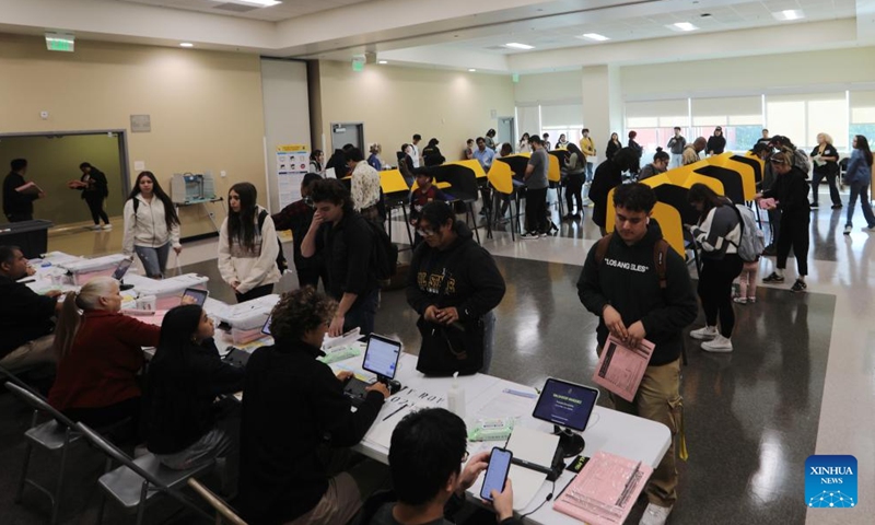 Voters line up to register at a polling station during the 2024 U.S. presidential election in Los Angeles County, California, the United States, on Nov. 5, 2024. (Photo: Xinhua)