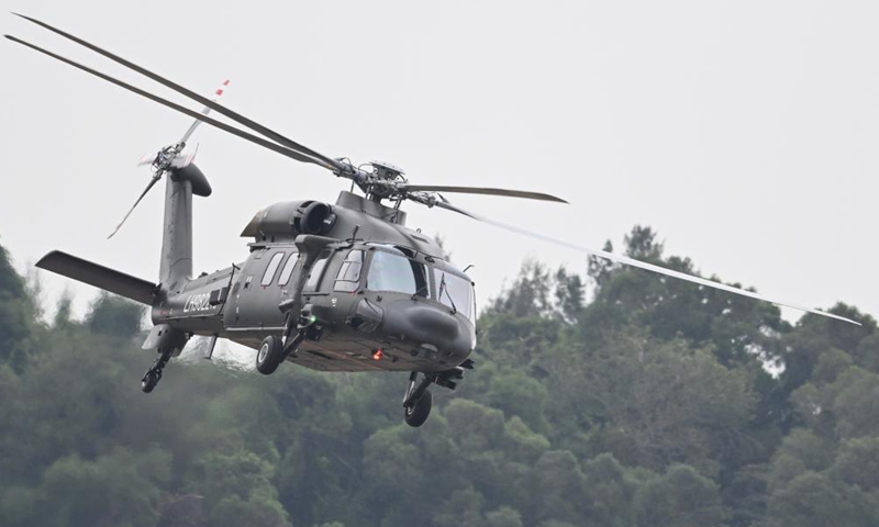 A Z-20 helicopter conducts adaptive training for the upcoming Airshow China in Zhuhai, south China's Guangdong Province, Nov. 10, 2024. The 15th China International Aviation and Aerospace Exhibition, also known as Airshow China, will be held in Zhuhai from Nov. 12 to 17. (Xinhua/Deng Hua)