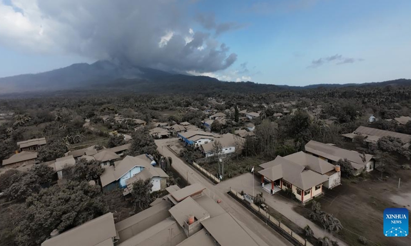 An aerial drone photo provided by the National Disaster Management Agency (BNPB) shows residential area covered by volcanic materials spewing from Mount Lewotobi Laki-Laki in Boru village of East Flores regency, East Nusa Tenggara, Indonesia, Nov. 10, 2024. (BNPB/Handout via Xinhua)