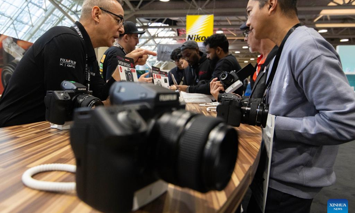 People visit the ProFusion Expo 2024 in Toronto, Canada, on Nov. 6, 2024. As one of the largest photo and video events in Canada, this annual two-day event kicked off here on Wednesday, attracting many imaging professionals and enthusiasts. (Photo: Xinhua)