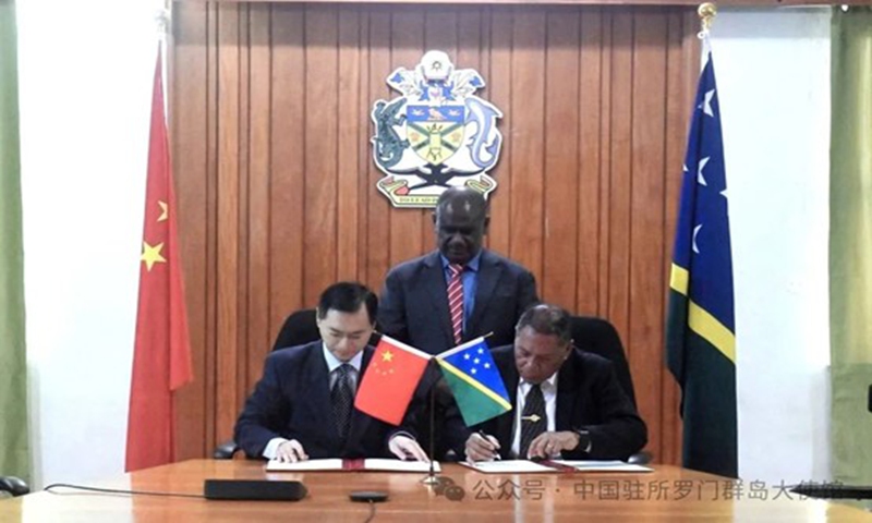 Chinese Ambassador to the Solomon Islands Cai Weiming and the Foreign Minister of the Solomon Islands Peter Shanel Agovaka, represented both governments to sign the agreement to to waive visa requirements for each other's citizens. Photo: Chinese Embassy in the Solomon Islands