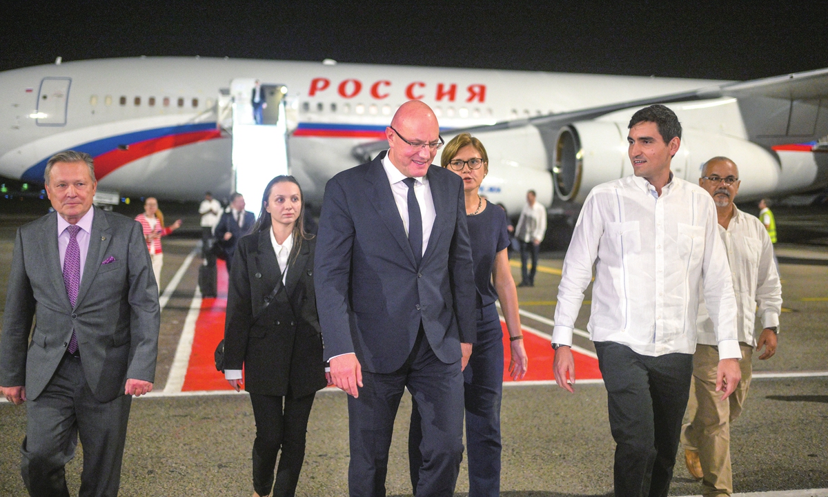 

Russia's Deputy Prime Minister Dmitry Chernyshenko (center) is welcomed at an airport in Havana, Cuba, on November 8, 2024. Chernyshenko arrived in Havana to take part in a co-chairs' meeting of the Russian-Cuban Intergovernmental Commission on Trade, Economic, Scientific, and Technical Cooperation. Photo: VCG