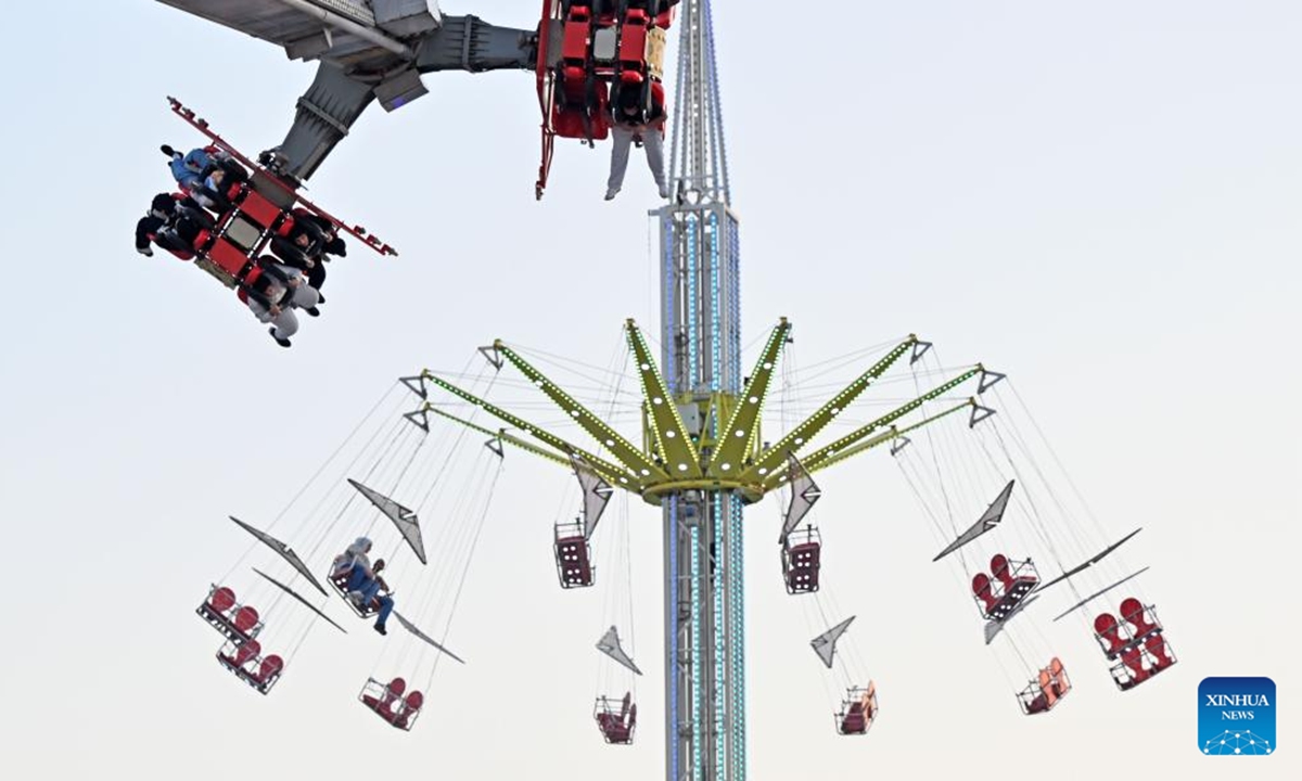 People enjoy their time at Winter Wonderland Kuwait in Hawalli Governorate, Kuwait, Nov. 7, 2024.

Winter Wonderland Kuwait, one of the largest entertainment projects in the country, opened its third season here on Thursday.(Photo: Xinhua)