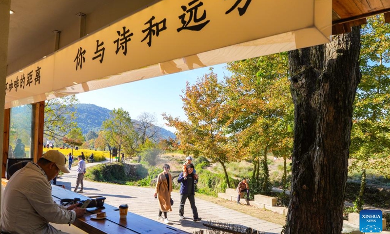 Tourists visit a scenic spot at Tachuan Village, Yixian County, Huangshan City, east China's Anhui Province, Nov. 8, 2024.  (Photo: Xinhua)