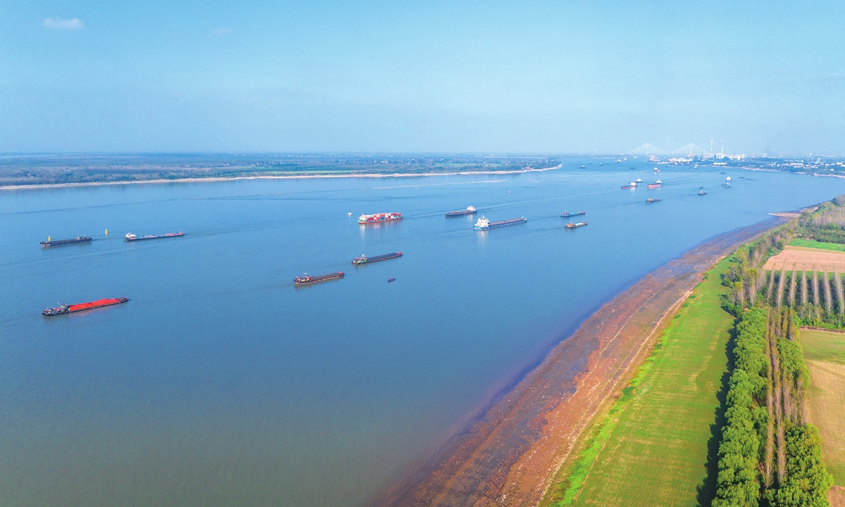 Cargo ships carrying all types of commodities are busy in Wuhu, East China's Anhui Province on November 10, 2024. The local district has adhered to giving priority to ecological issues and green development, aiming to provide a strong impetus for the high-quality development of the Yangtze River Economic Belt. Photo: cnsphoto