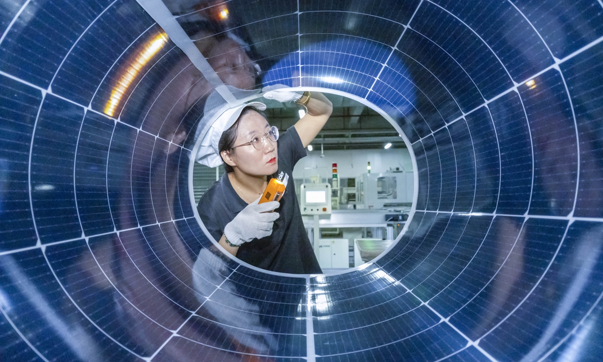 Technicians test new photovoltaic module products in a factory in Hefei, East China's Anhui Province on October 22, 2024. Photo: VCG