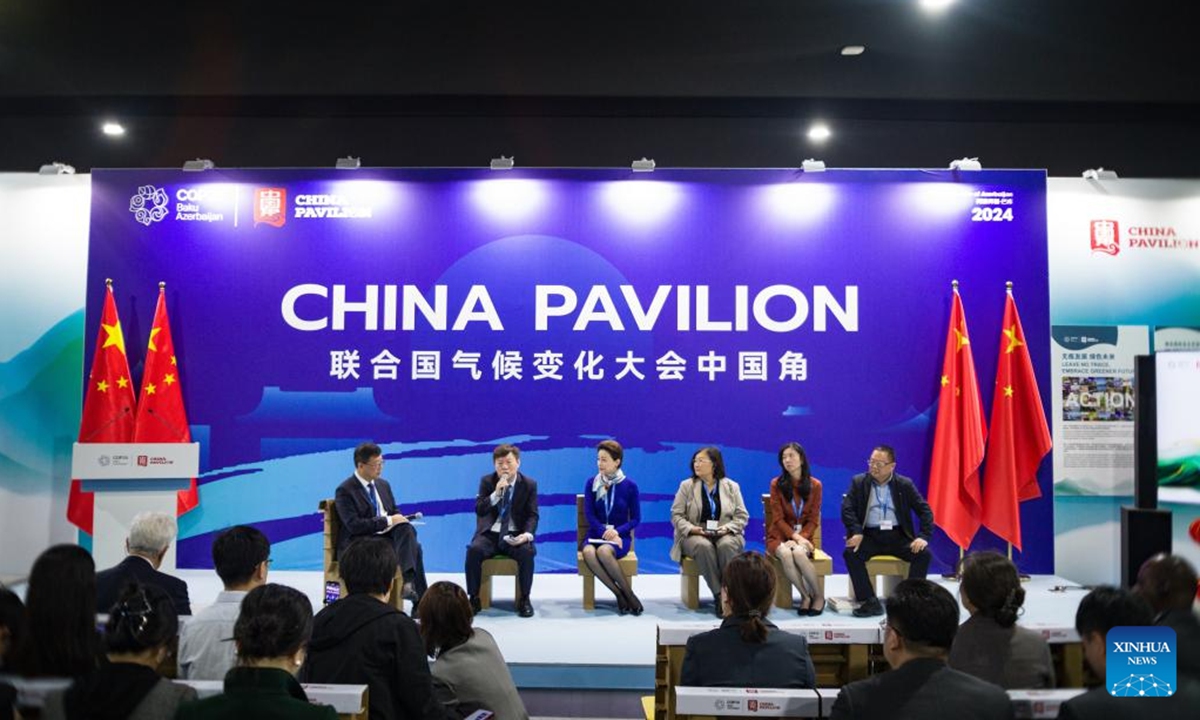 People attend a side meeting marking the opening of the China Pavilion at the 29th session of the Conference of the Parties to the United Nations Framework Convention on Climate Change (UNFCCC), or COP29, in Baku, Azerbaijan, Nov. 11, 2024.  (Photo: Xinhua)