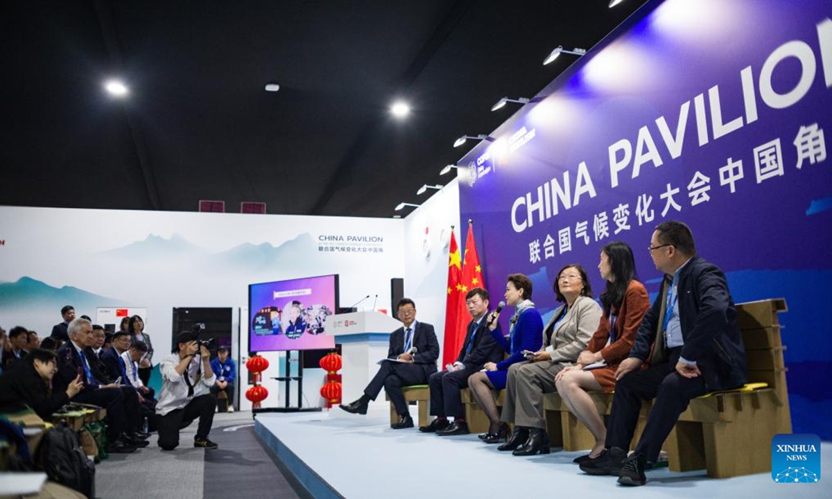 People attend a side meeting marking the opening of the China Pavilion at the 29th session of the Conference of the Parties to the United Nations Framework Convention on Climate Change (UNFCCC), or COP29, in Baku, Azerbaijan, Nov. 11, 2024.  (Photo: Xinhua)