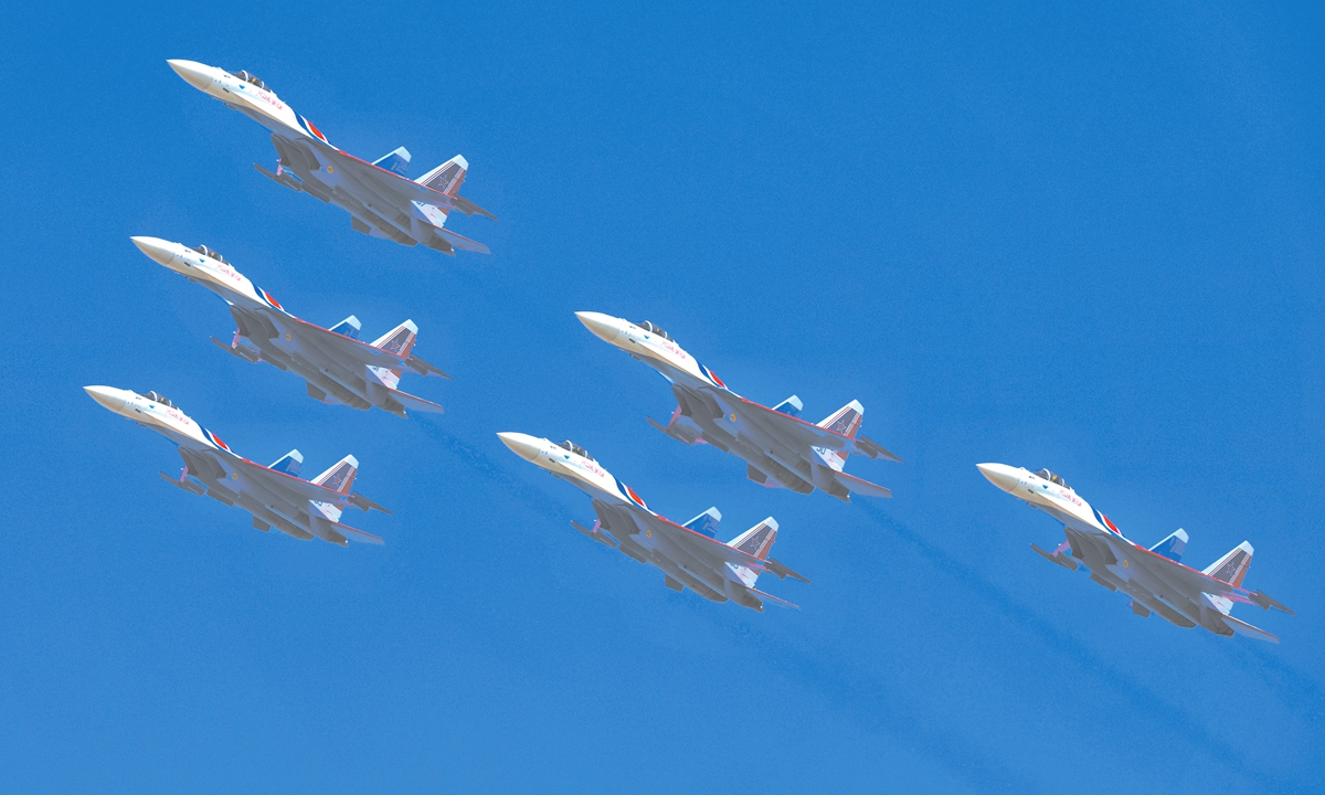 The Russian Knights aerobatic team makes a stunning return to the Airshow China with their newly equipped Su-35S heavy fighter jets on November 12, 2024. The Su-35S' engines feature three-dimensional thrust vectoring nozzles, which further enhance the aircraft's maneuverability and allow pilots to perform many aerobatic maneuvers that are difficult for other aircraft to achieve. Photo: Cui Meng/GT