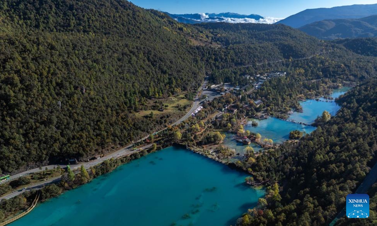 An aerial drone photo taken on Nov. 9, 2024 shows the scenery of Lanyue (Blue Moon) Valley in Lijiang, southwest China's Yunnan Province. With the goal to build a world famous tourism city, Lijiang has been improving the service in its scenic spots such as Lijiang ancient town and Yulong Snow Mountain, in an effort to promote the high-quality development of its cultural tourism market. (Photo: Xinhua)