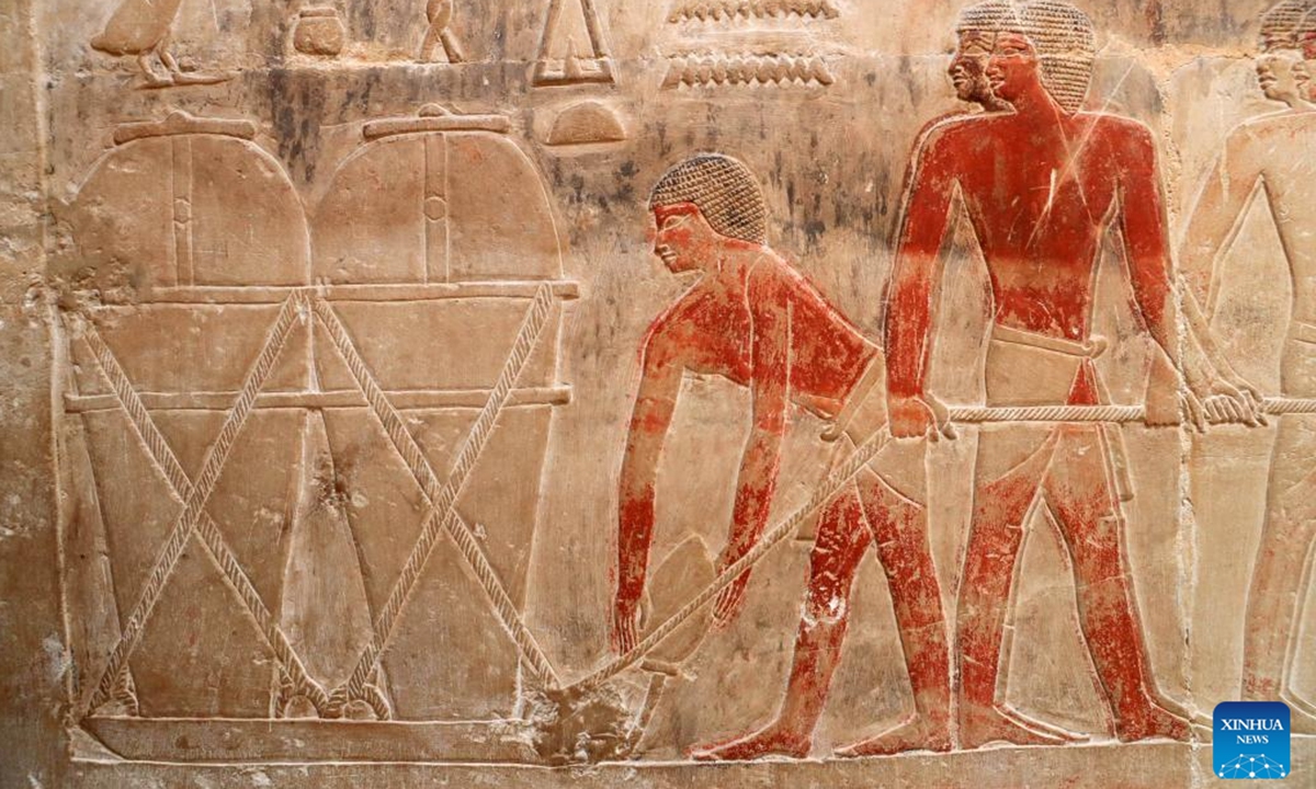 This photo taken on Nov. 12, 2024 shows a colored relief painting inside the tomb of an official of ancient Egypt in Saqqara necropolis, south of Cairo, Egypt. The Saqqara necropolis is home to numbers of noble tombs, in which many colored relief paintings depicting ancient Egyptian daily life are still well preserved.  (Photo: Xinhua)